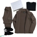 طقم كتان مبطن فرو لون شوكو: جاكيت وبنطال وحذاء رياضي أسود، يعرض الأناقة الشتوية الفخمة.