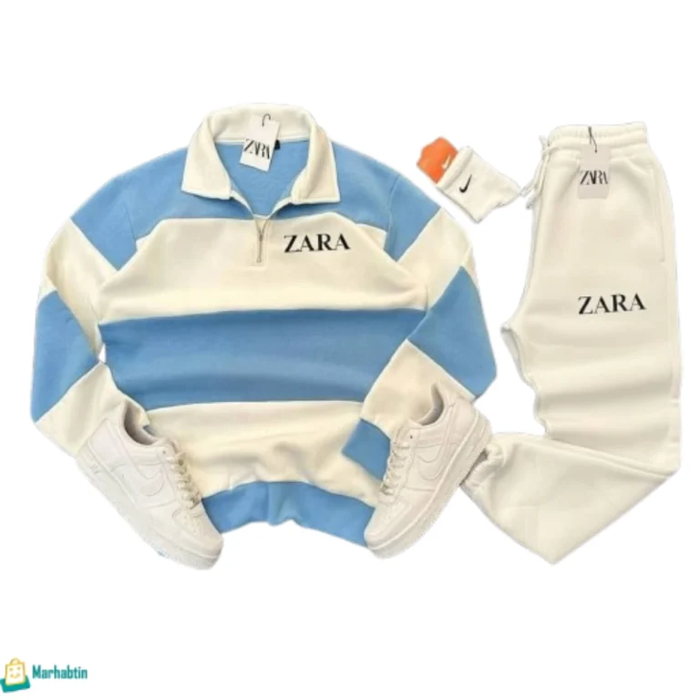 ترنج رجالي فليس سميك لون أزرق فاتح وأبيض مخطط، تصميم عصري، خامة مخملية ناعمة بألوان هادئة ومميزة.