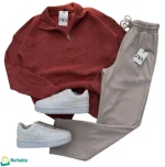 طقم شتوي رجالي قطعتين بلون صدئي عصري، بلوزة تريكو سميكة وبنطال ريب بيج مريح.