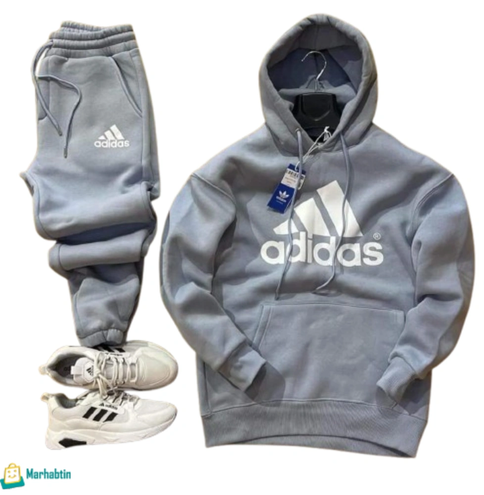 trinj-shetawi-rajali-fleece-grey.webp ترينج شتوي رجالي فليس. طقم رياضي شتوي رجالي لون رمادي فاتح بشعار Adidas كبير.